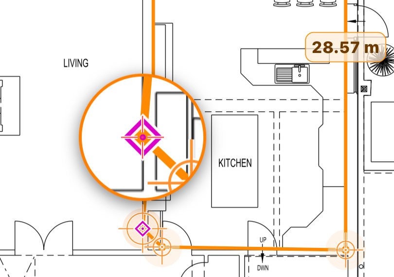 Close-up of a floor plan while drawing a Skirting perimeter with Snap on. The magnifier shows the orange line meeting a wall, with a magenta diamond marker on the wall line where the point will land. A second small magenta marker sits on the drawing below it, and the running length reads 28.57 m.